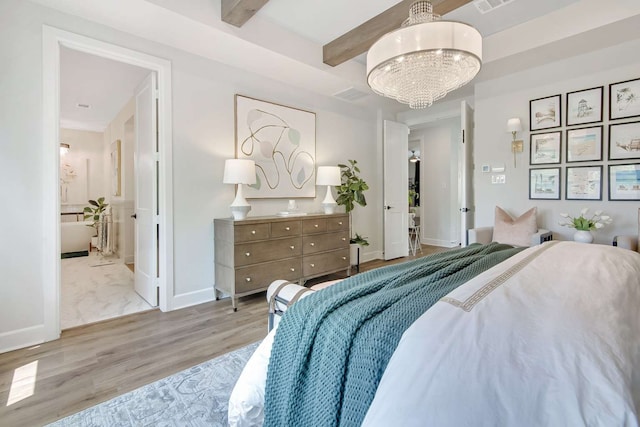 bedroom featuring light wood-type flooring, a notable chandelier, and beam ceiling