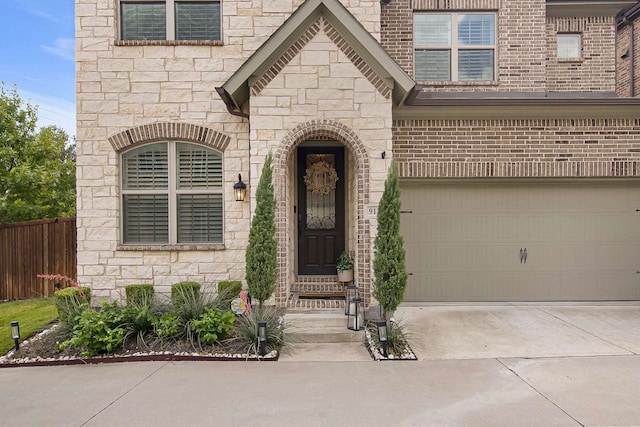 entrance to property featuring a garage