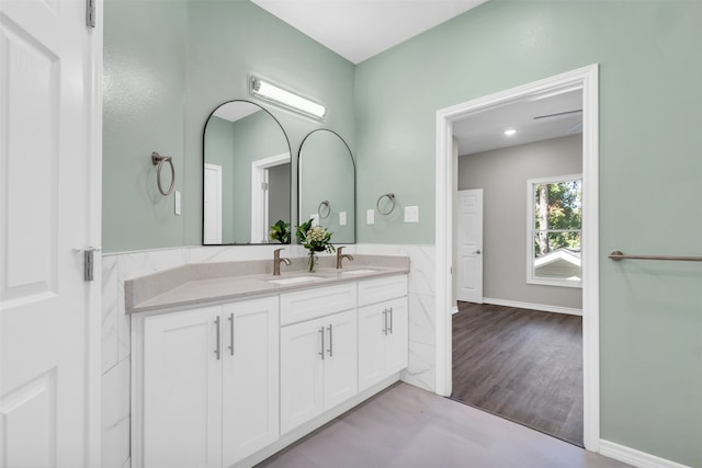 bathroom featuring wood-type flooring and vanity