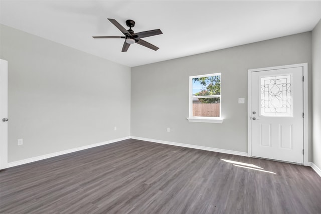 foyer entrance featuring ceiling fan and dark hardwood / wood-style flooring