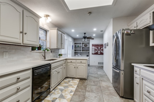 kitchen featuring tasteful backsplash, kitchen peninsula, dishwasher, ceiling fan, and sink