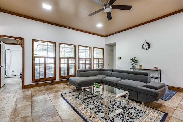 living room featuring ornamental molding and ceiling fan