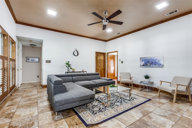 living room featuring crown molding and ceiling fan