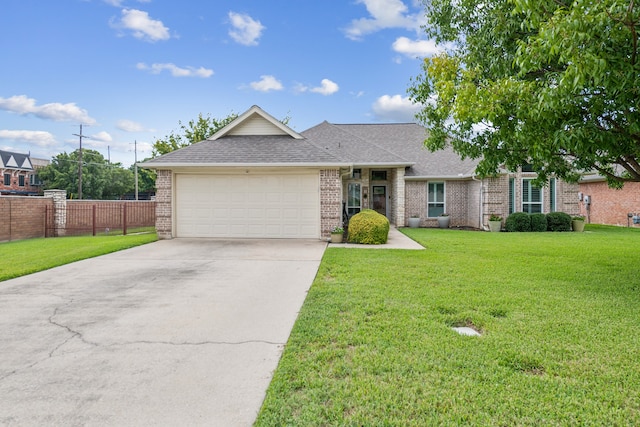 ranch-style house with a front yard and a garage