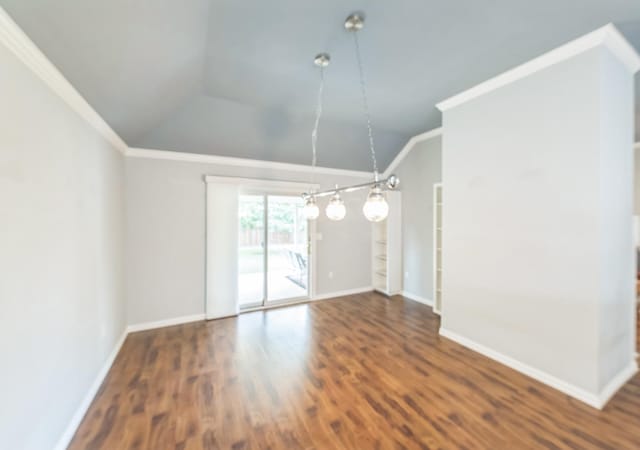 unfurnished room with lofted ceiling, dark wood-type flooring, and crown molding