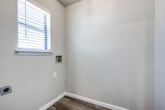 laundry room with baseboards, laundry area, hookup for a washing machine, electric dryer hookup, and dark wood-style flooring