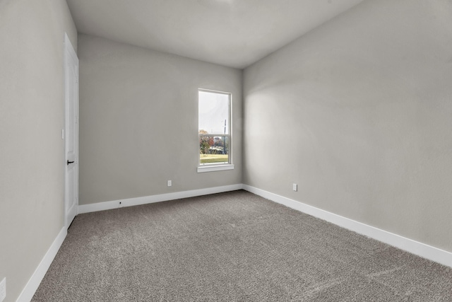 unfurnished room featuring carpet floors