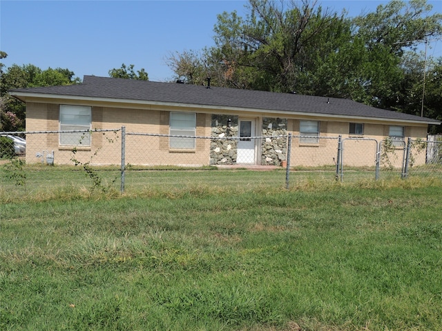 ranch-style house with a front yard