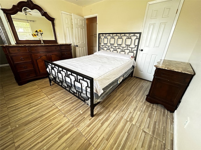 bedroom with light hardwood / wood-style floors