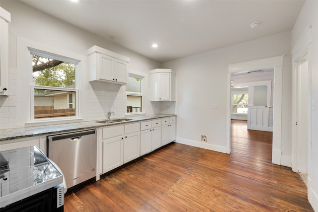 kitchen with white cabinetry, sink, light stone countertops, dark hardwood / wood-style floors, and dishwasher