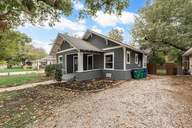 exterior space with cooling unit and covered porch