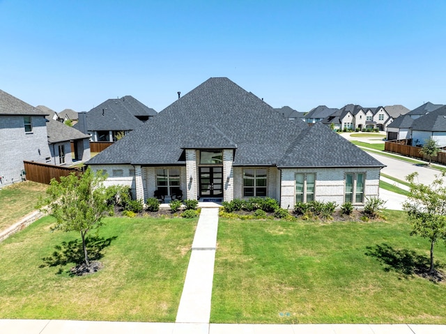 view of front of home featuring a front lawn