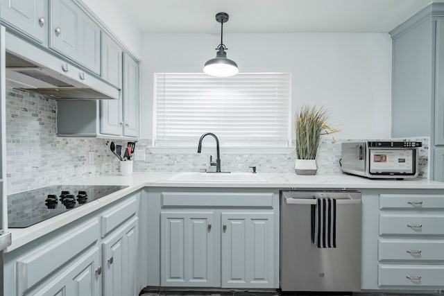 kitchen featuring sink, stainless steel dishwasher, backsplash, gray cabinets, and custom range hood