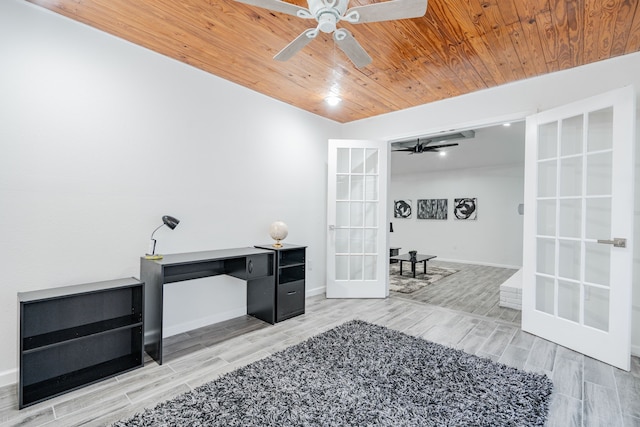 interior space featuring ceiling fan, wood ceiling, french doors, and hardwood / wood-style floors