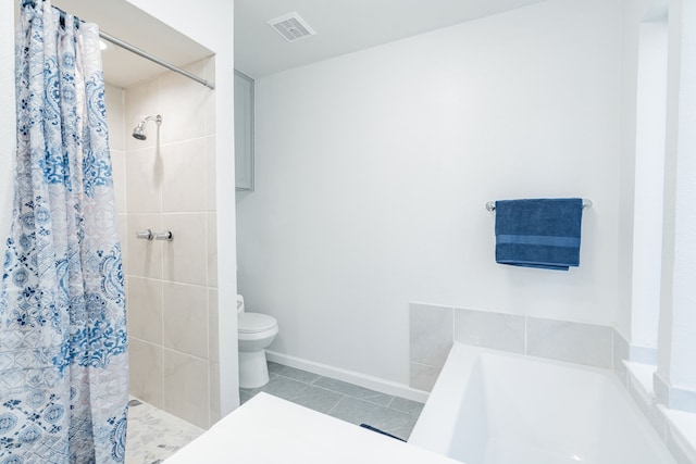 bathroom featuring independent shower and bath, tile patterned flooring, and toilet