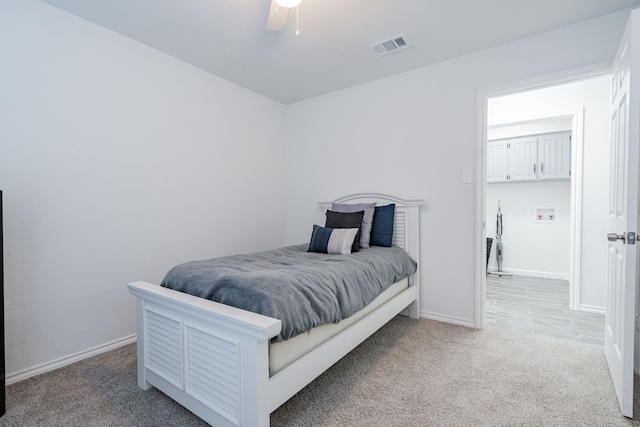 carpeted bedroom with ceiling fan