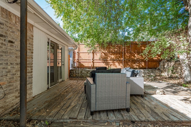 deck featuring outdoor lounge area