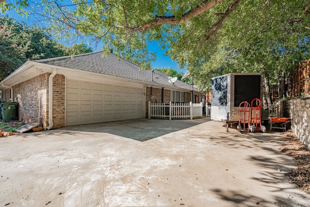 exterior space featuring a garage