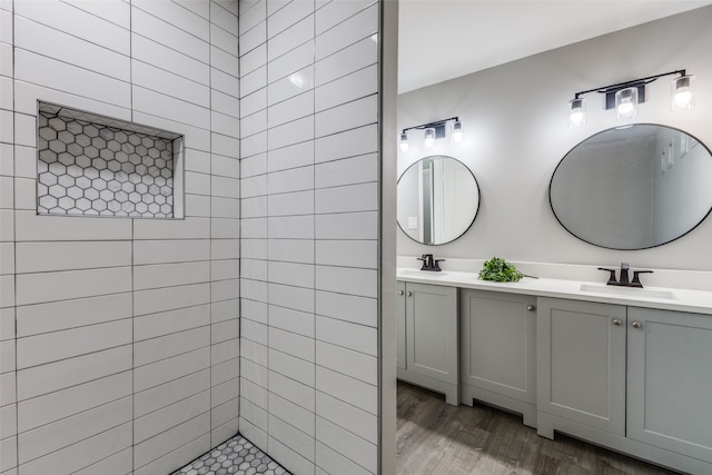 bathroom with wood-type flooring and vanity