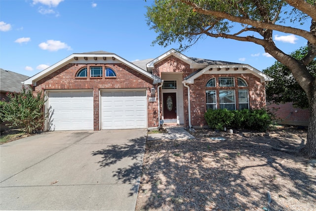 view of front of property with a garage