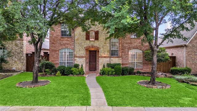 view of front of home with a front lawn