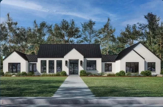 modern farmhouse style home with a front lawn