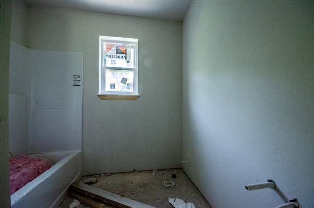 bathroom featuring a tub