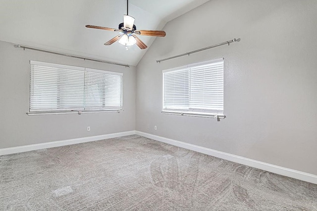 spare room with carpet flooring, ceiling fan, and lofted ceiling