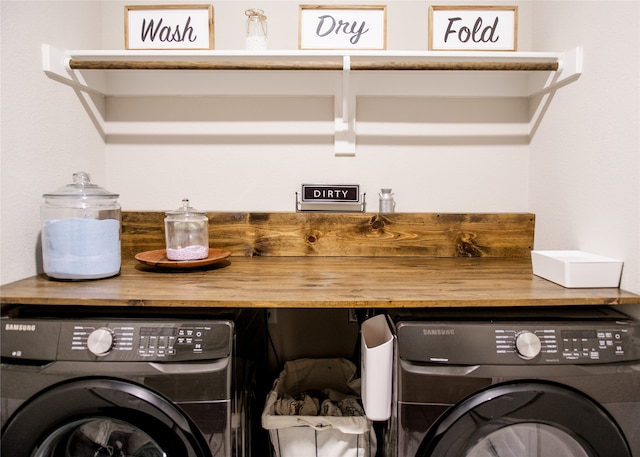 laundry area with washer and clothes dryer