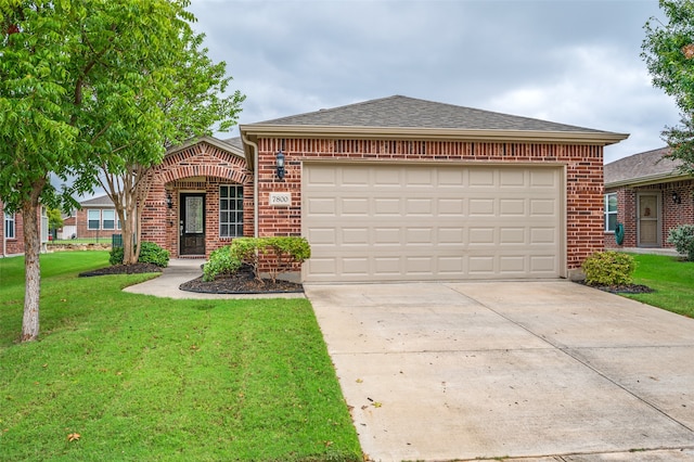 view of front facade featuring a front lawn and a garage