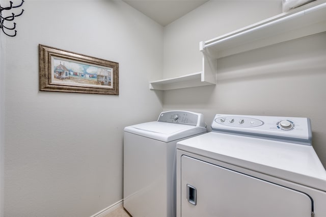 laundry room with separate washer and dryer