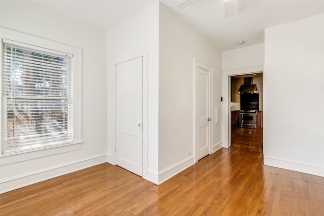 corridor featuring light hardwood / wood-style floors