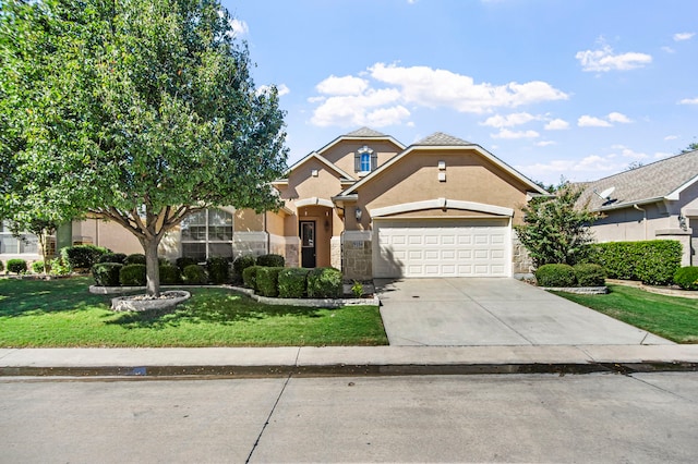 view of front of property featuring a garage and a front lawn