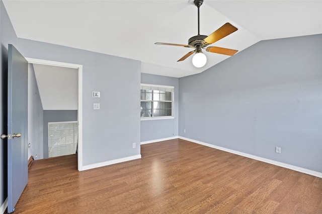 unfurnished room with hardwood / wood-style floors, ceiling fan, and lofted ceiling