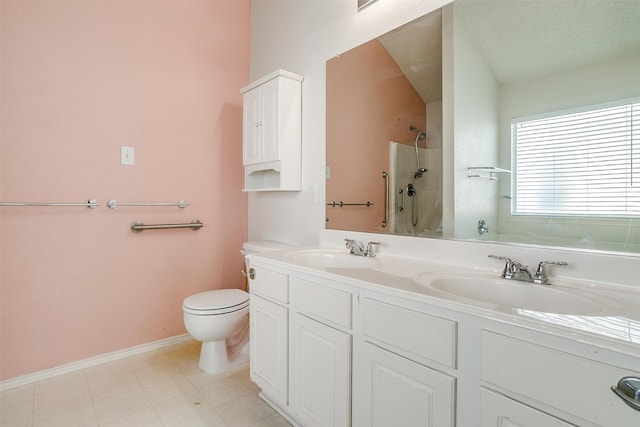 full bathroom featuring shower / washtub combination, vanity, a textured ceiling, toilet, and tile patterned floors