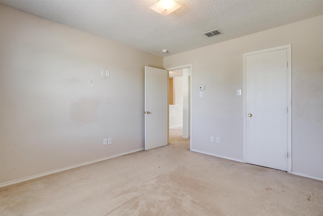 interior space featuring a textured ceiling