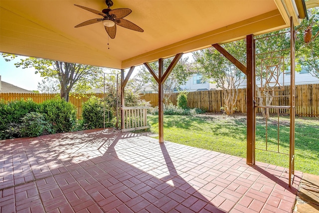 view of patio featuring ceiling fan