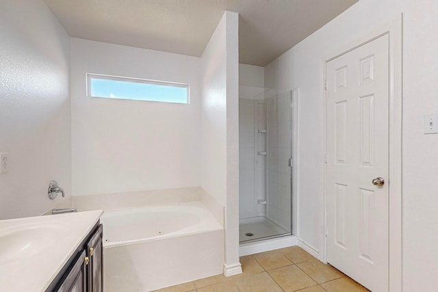 bathroom with vanity, separate shower and tub, and tile patterned floors