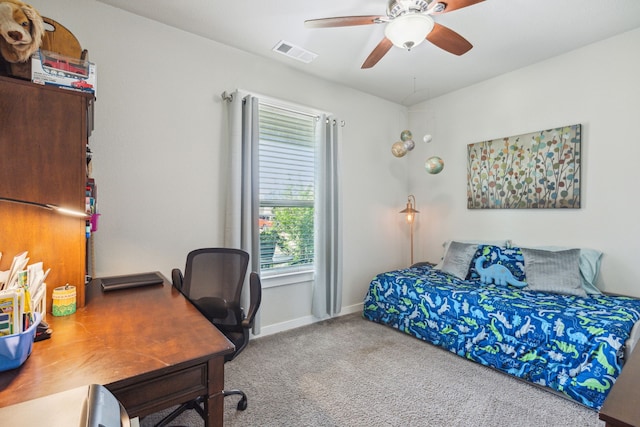 carpeted bedroom with ceiling fan