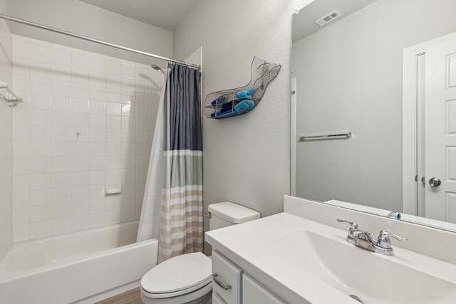 full bathroom with toilet, vanity, and shower / tub combo with curtain