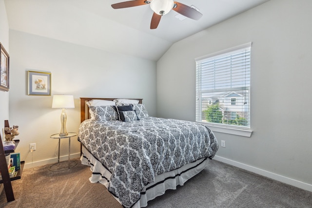 bedroom with ceiling fan, carpet flooring, and lofted ceiling