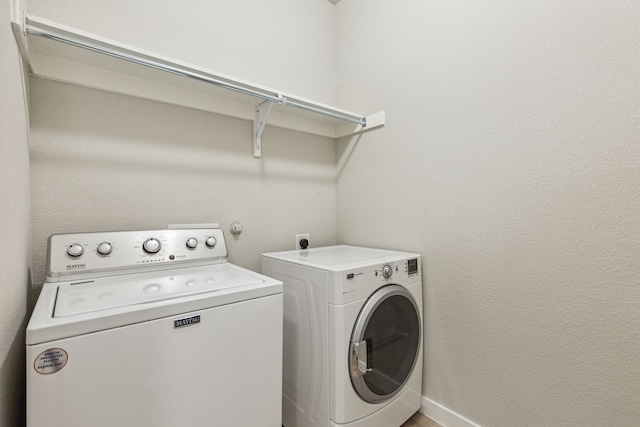 laundry area with washer and dryer