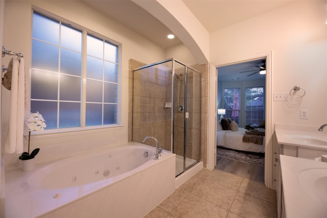 bathroom with independent shower and bath, vanity, tile patterned floors, and ceiling fan