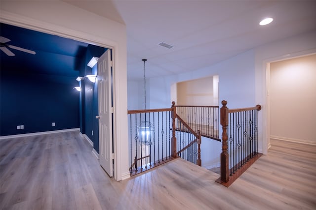 hall with light wood-type flooring