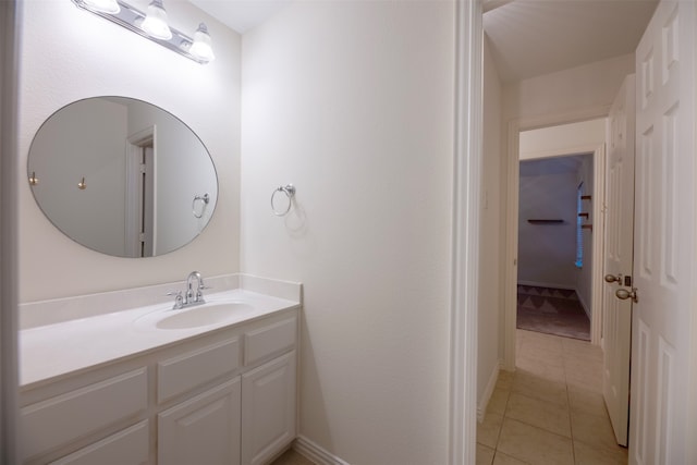 bathroom featuring tile patterned floors and vanity