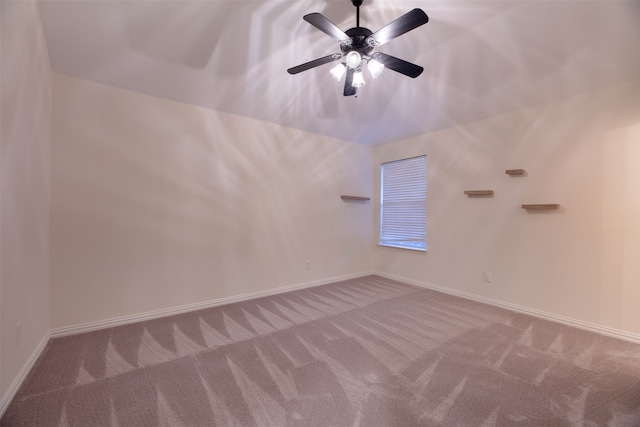 unfurnished room featuring carpet and ceiling fan