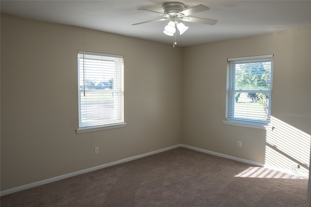 unfurnished room with carpet floors and ceiling fan