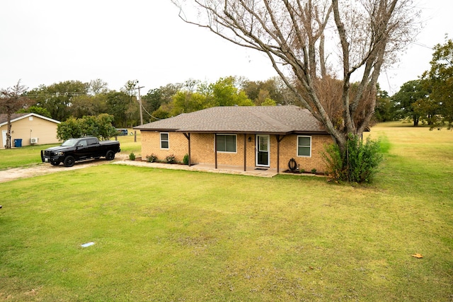 ranch-style house with a front yard