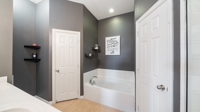 bathroom featuring a bathtub and tile patterned floors