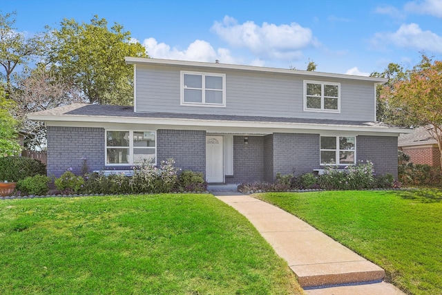 front facade with a front lawn